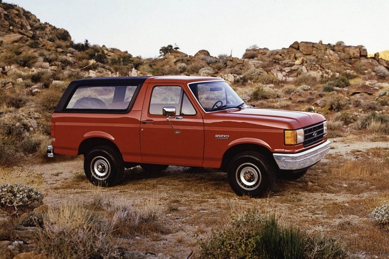 1987 Ford Bronco Custom shown in Bright Canyon Red